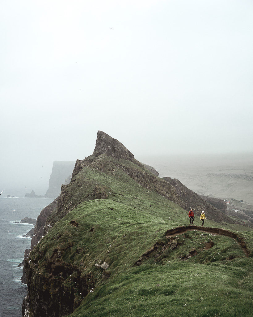 Luke and Nell hiking on the Faroe Islands during a trip to Mykines island to see the puffins and lighthouse. 