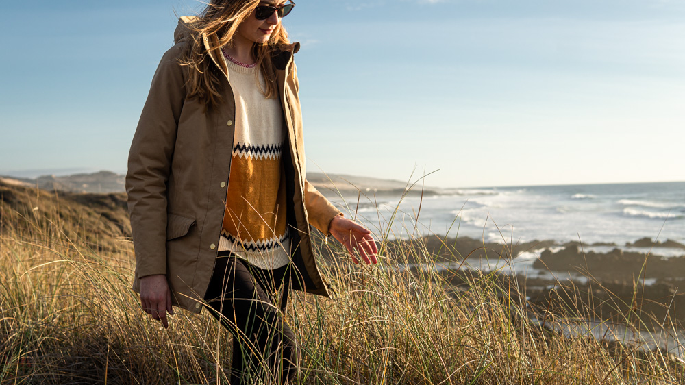 Nell wearing a Two Thirds sweater -and they're one of our favourite stylish walking clothes brands- out on the coastal Rota Vicentina trail in south-west Portugal