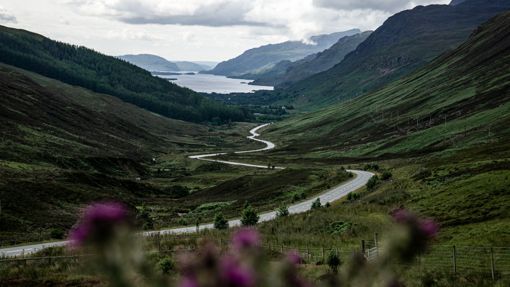A winding road through the Scottish Highlands