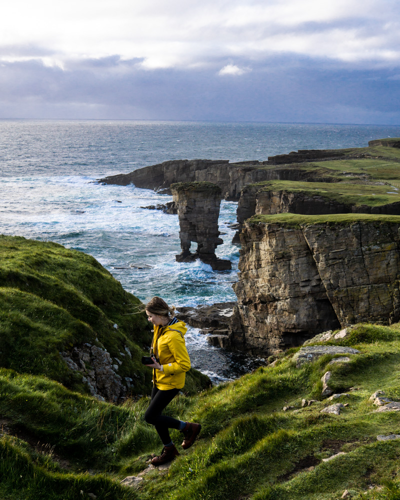 Nell walking along the cliffs of Yesnaby in the Orkney Islands